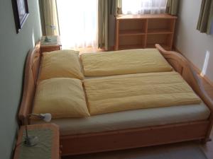 Łóżko lub łóżka w pokoju w obiekcie Apartment Neuhauser