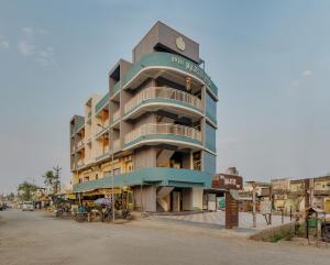 a building on the side of a street at Majestic Royal by Travel Pleasure Hotels in Akalkot