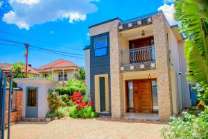 a house in the suburbs of australia at Relaxing Lodge in Kigali