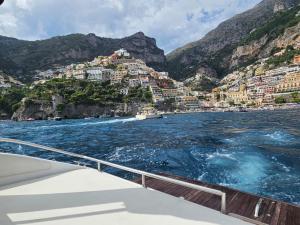 a view of the amalfi coast from a boat at Domus Fontana in Pompei