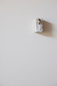 a white object sitting on top of a white wall at Maison d'Artiste in Ghent