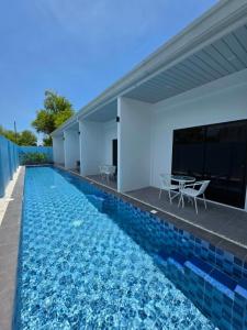 an image of a swimming pool in a house at MSResort Panglao in Looc