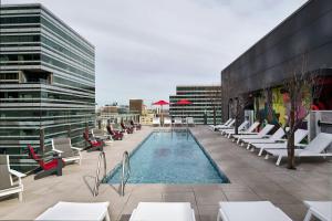 a pool on the roof of a building at citizenM Austin Downtown in Austin