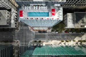 an overhead view of a building with a swimming pool at citizenM Austin Downtown in Austin