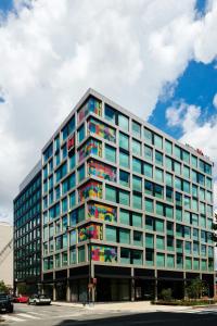 a large building with many windows on a street at citizenM Washington DC NoMa in Washington, D.C.