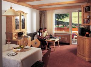 A television and/or entertainment centre at Residence La Selva