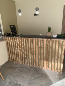 a wooden bar in a room with a desk at Anemoni Studios in Plakias +213 photos