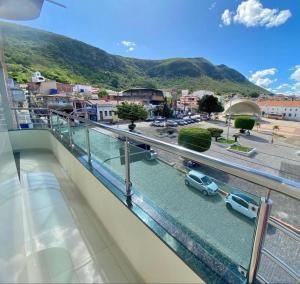 a view of a city from the balcony of a building at Monte Santo palace hotel in Monte Santo