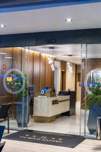 an office with a reception desk and a lobby at Duka's Boutique Hotel in Ksamil +289 photos