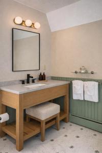 a bathroom with a sink and a mirror at The Manchester View in Manchester +34 photos