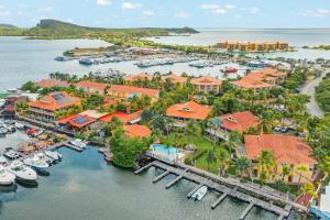 an aerial view of the marina at the resort at Marina Apartment A2, luxury waterfront apartment Spanish Water, Jan Thiel, Curaçao in Jan Thiel