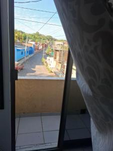 a view of a street from a window at Hospedaje Samao in Santa María del Oro