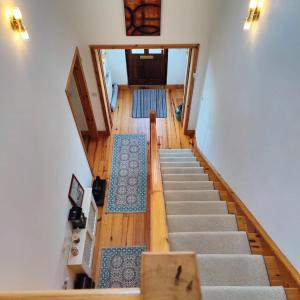 an overhead view of a staircase in a house at Boherbui B&B in Doolin