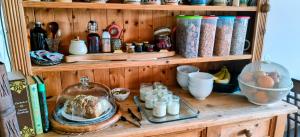 a wooden shelf with eggs and other items on it at Boherbui B&B in Doolin +35 photos