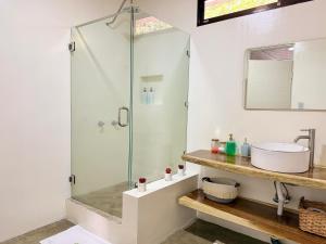 a bathroom with a shower and a sink at Casa Boho in Quesada +9 photos