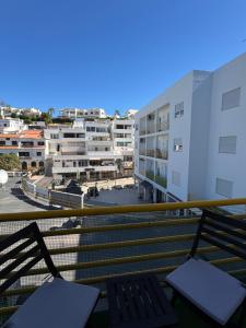 a balcony with a view of a city at Cerro Apartment in Carvoeiro