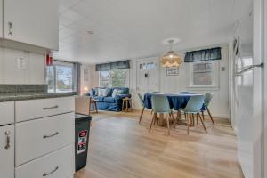 a kitchen and dining room with a table and chairs at Cornish Cottage Walk to Long Sands Beach in York