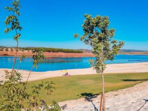 a view of a beach with a body of water at Ferreira do Alentejo Terrace Rustic Villa in Beja
