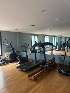a gym with several exercise bikes in a room at Vestigia Nueva Castilla in Sigüenza