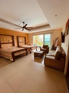 a large living room with a bed and a couch at Lakeview Granada Hotel Boutique in Granada