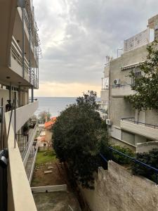 a view of the ocean from a building at Sophia's studio in Saronida