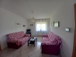 a living room with two couches and a coffee table at Casa Vacanze Relax in Agropoli