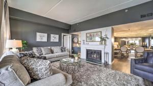 a living room with a couch and a fireplace at 3 Mi to Skiing Mtn-View Condo in Sugar Top Resort in Sugar Mountain