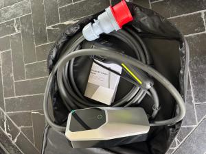 a fire hydrant with a hose and a charger at WohlfühlWerk L3 in Mechernich