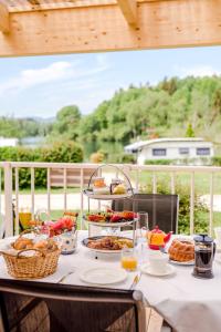 a table with food on top of a table at Relax Camping Seewirt in Feldkirchen in Kärnten