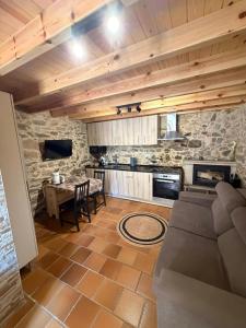 a living room with a couch and a table at "la Casita" in Boiro