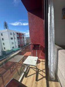 a chair sitting on top of a balcony at The Spring Collection in Tatu City