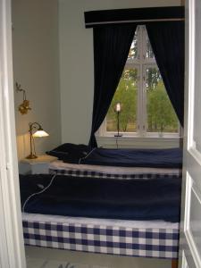 Postel nebo postele na pokoji v ubytování Södra Lund B&B