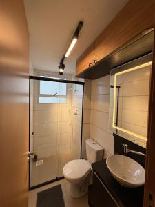 a bathroom with a toilet and a sink at 098house havana in São Luís