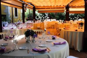 a table set up for a wedding with white tables and chairs at Hotel Punta Me Torreblanca Palace in Guadarrama