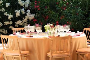 a table with wine glasses on top of it at Hotel Punta Me Torreblanca Palace in Guadarrama