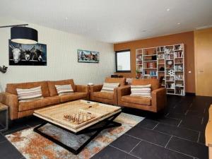 a living room with two couches and a coffee table at Exclusive Stunning Views Pool in Road Town