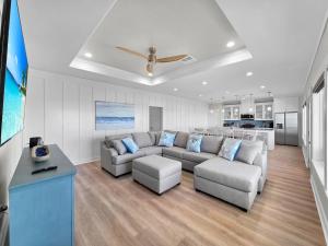 a living room with a couch and a table at Blue Anchor home in Crystal Beach