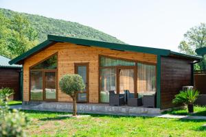 a small house with a green roof at Oria Retreat in Danilovgrad