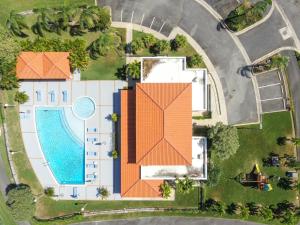 an overhead view of a house with an orange roof at Solimar Villa Family Vacation Spot in Playa de Guayanes