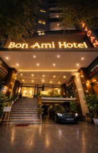 a car parked in front of a building at night at Bon Ami Hotel - Thiên Xuân in Ho Chi Minh City