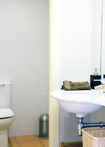 a bathroom with a sink and a toilet at Ca l'Helena in Castellet