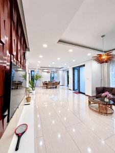 a living room with a couch and a table at Luxury villa Phu Quoc in Phú Quốc