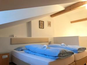 Posteľ alebo postele v izbe v ubytovaní Argentieri Guesthouse