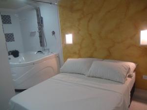 Кровать или кровати в номере San San Andrés Casa Vacacional 2 by bbbsai +18 фотографий