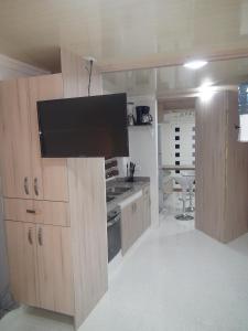 Кухня или мини-кухня в San San Andrés Casa Vacacional 2 by bbbsai
