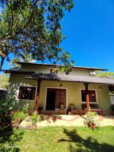 a house with a patio in front of it at Sithula Villa in Bentota