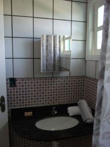 Phòng tắm tại Pousada Labella Monick