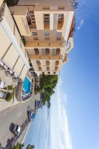 an overhead view of a building next to the ocean at Aparthotel Milenij in Baška Voda