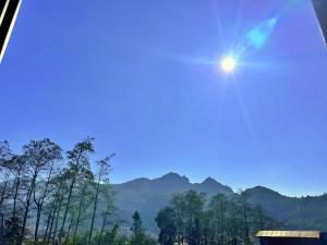 a view of the mountains from a train window at Calla Lily Hotel in Sapa +19 photos