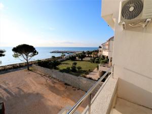 a view of the ocean from the balcony of a house at Antodo in Novalja